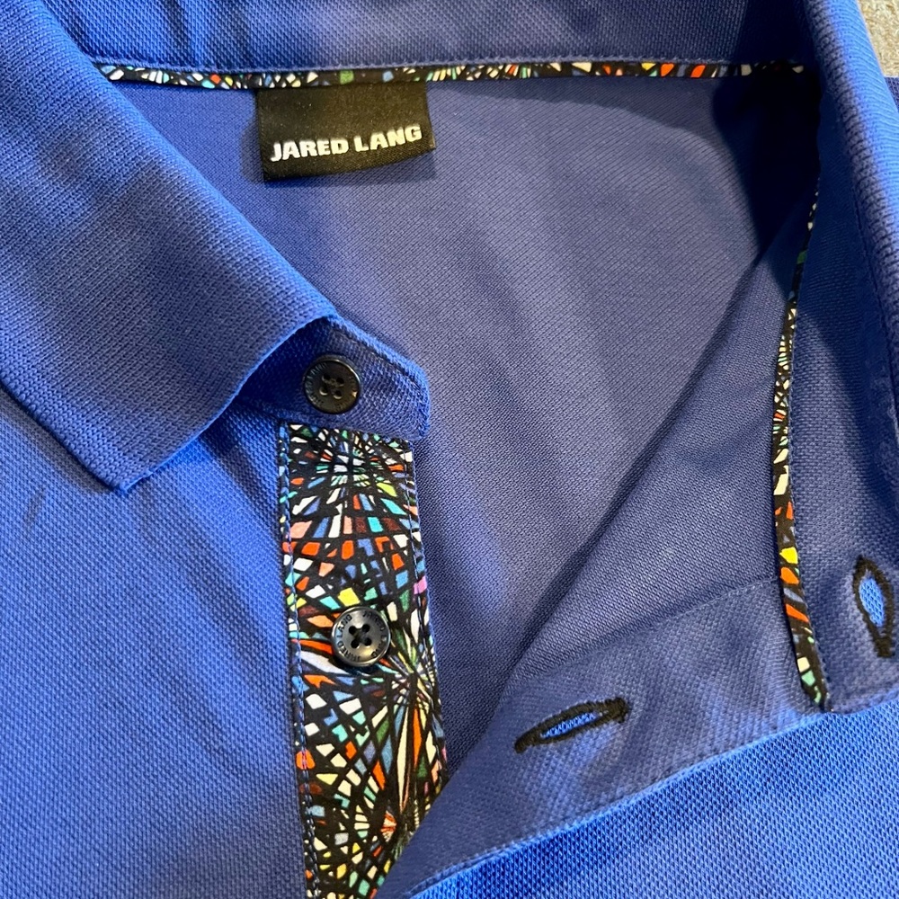 Royal blue polo with novelty contrasting trim on placket